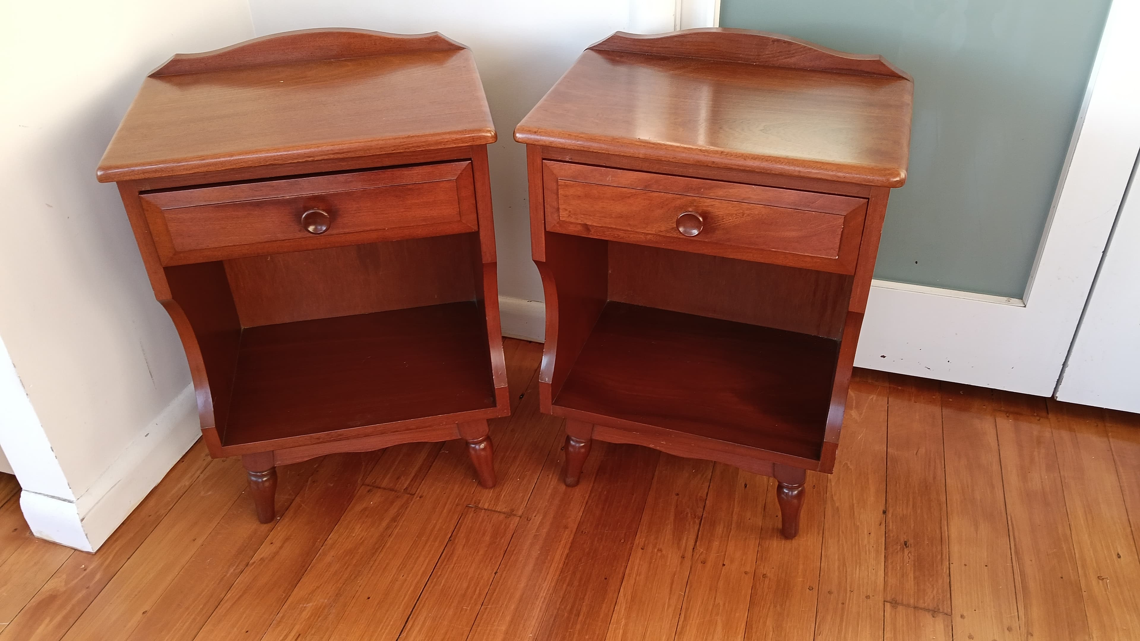 Mid century pair of Mahogany Bedsides
